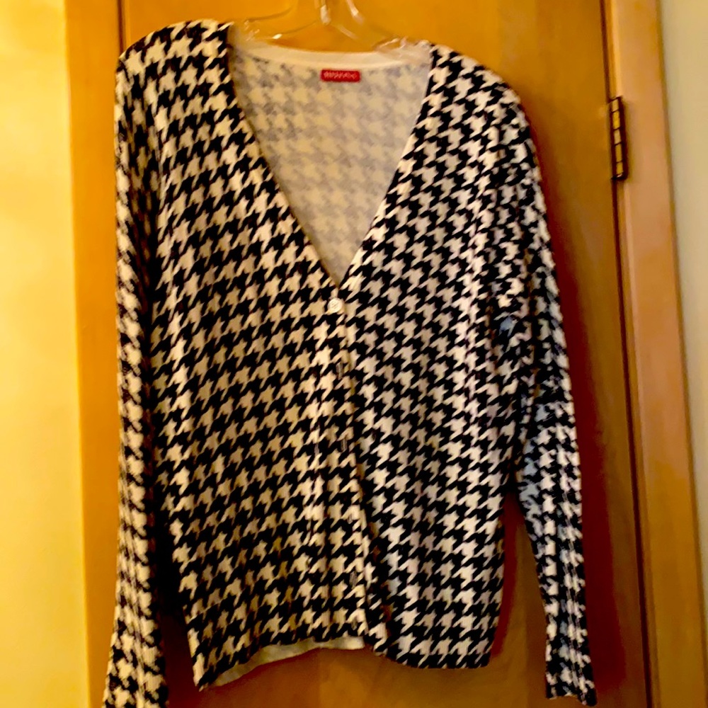 Tweed size large from target. Nice sweater V-neck buttons down front